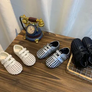 Breathable woven Mary Jane sandals in white, silver, and black with velcro straps.