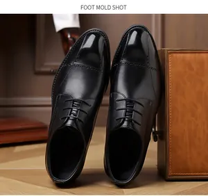 Detailed view of black leather brogue shoes with elegant lace-up design for men