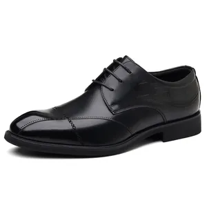 Elegant black leather oxfords with brogue detailing for men's formal business wear