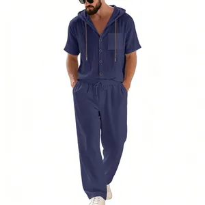 Men's navy blue linen hooded shirt and matching trousers set for beach and casual wear.