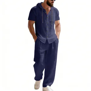 Full view of a men's navy blue linen hooded shirt and breathable long pants set.