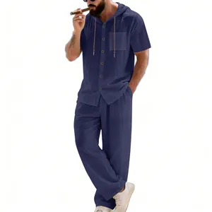 Men's blue linen-style two-piece set featuring a short-sleeve hooded shirt and loose pants