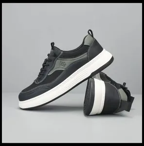 Dettaglio vista laterale di sneakers casual da uomo in mesh nero e pelle con suola spessa