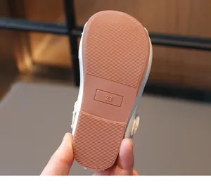 Close-up of durable non-slip rubber sole with size 23 marking for toddler girls' flat shoes
