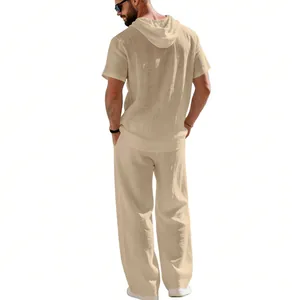 Back view of men's beige linen hooded short-sleeve shirt and matching trousers set