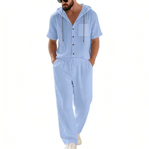 Full-body view of men's light blue linen set with hooded shirt and loose long pants