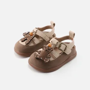 Cute baby girls' soft-sole walking sandals with brown teddy bear cartoon design