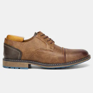 Side profile of vintage brown men's casual dress shoes with detailed leather texture.