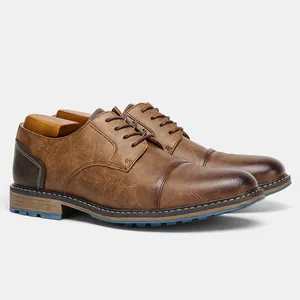 Detailed side view of vintage brown men's dress shoes with textured leather and blue sole detail.