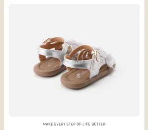 Detailed back view of silver toddler girl sandals with lace butterfly and velcro