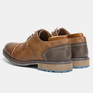 Rear view of vintage brown men's dress shoes showing heel detail and contrast stitching