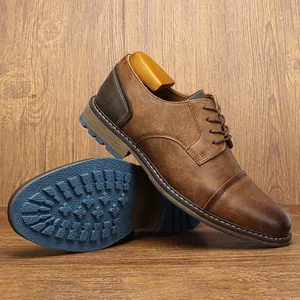 Vintage brown leather men's derby shoes with unique blue textured sole