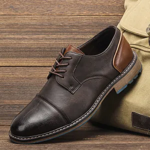 Close-up detail showing the rich texture of vintage brown leather oxford shoes for men