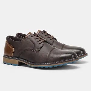 Men's vintage brown faux leather dress shoes with decorative blue rubber lug soles
