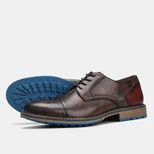 Classic brown leather men's dress shoes showing side profile and blue anti-slip sole
