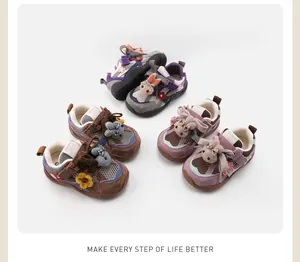 Detailed group view of toddler sports shoes with cute plush rabbit and flower decor.