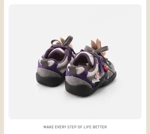 Rear view of baby purple sports shoes with cute rabbit ear design and soft rubber soles