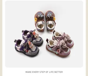 Detail of cute toddler sneakers with plush rabbit decorations and non-slip soft soles