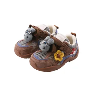 Baby brown mesh sneakers with plush bunny and flower decor, soft non-slip sole.