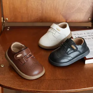 Scarpe in pelle stile britannico per bambini con suole morbide e dettagli brogue