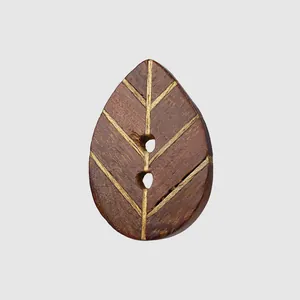 Elegant natural leaf-shaped ebony wood button with two holes for high-end garments