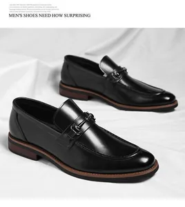 Close-up detail view of men's black formal business loafers with elegant metal bit hardware