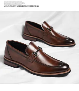 High-quality detailed view of classic brown leather loafers with elegant metal bit ornament