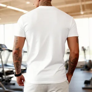 Back view of a breathable white crew neck men's fitness T-shirt in a professional gym environment