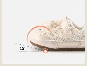 Detail view of cream toddler girl lace sneakers showing ergonomic 15-degree toe angle design