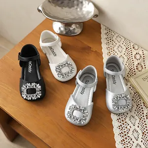 Detailed view of girls' princess shoes with sparkling rhinestone buckles in four colors