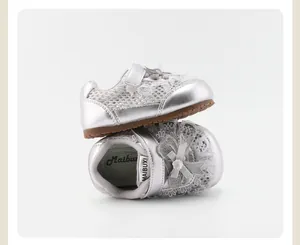 Detail of silver toddler girls mesh sneakers with bowknot and lace stacked view