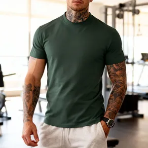 Close-up view of a dark green breathable quick-dry men's fitness T-shirt worn in a gym.