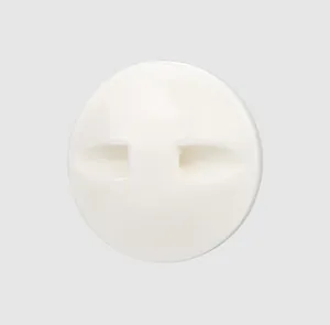 Macro view of premium deep sea white mother of pearl shell button for clothing