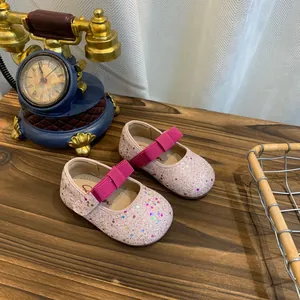 Sparkling pink glitter Mary Jane princess shoes for little girls with sequin details
