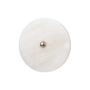 Premium Japanese white mother-of-pearl shell button with an elegant engraved floral pattern