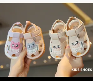 Cute cartoon cat baby sandals for toddlers featuring soft soles and adjustable velcro straps