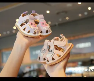 Detail of cute cartoon cat toddler sandals with soft soles for baby summer walking
