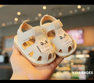 Detailed view of cute cartoon cat toddler sandals with soft soles for baby boys and girls