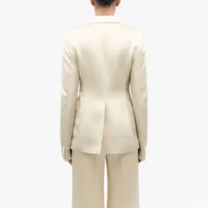 Elegant champagne satin tailored blazer featuring back vent detail on clean white background