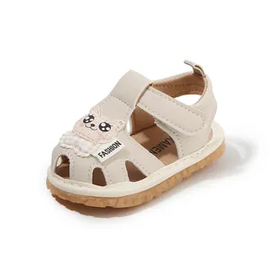Toddler sandals with cute cartoon bear patch and soft rubber sole in beige