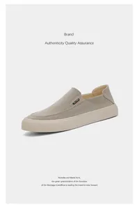 Minimalist grey canvas slip-on loafer for men featuring a durable textured rubber outsole.