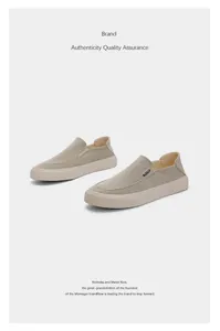 Modern grey minimalist canvas loafers for men with a low-top slip-on design for daily comfort
