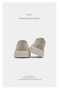 Detailed rear view of minimalist beige slip-on canvas loafers for men with textured soles