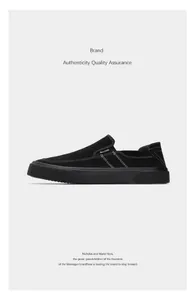 Classic black canvas slip-on loafers featuring a minimalist retro design and comfortable fit