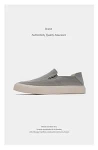 Minimalist grey canvas slip-on loafers for men featuring a clean and retro low-top design