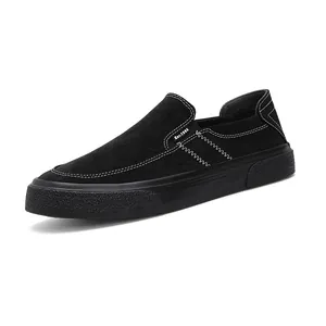 Minimalist retro black canvas slip-on loafers for men featuring elegant white contrast stitching.
