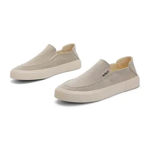 Classic minimalist men's casual low-top slip-on canvas shoes in neutral beige color tone