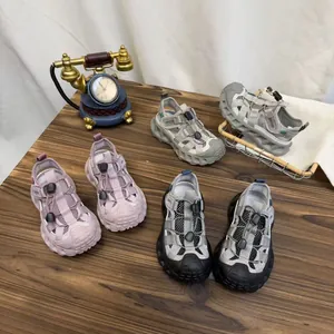 Detail view of breathable mesh children's sports sandals in three stylish colors