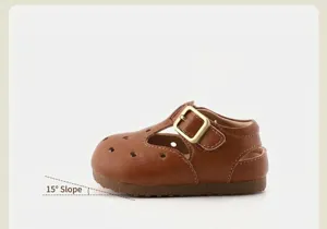 Detail view of baby soft-sole leather shoes with a 15-degree anti-kick toe lift