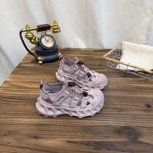 Detailed view of purple lavender breathable mesh sandals for children with soft soles